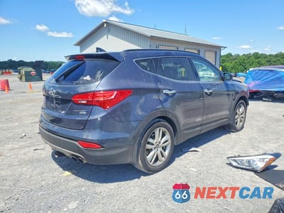 Trzecie zdjęcie samochodu z tyłu: 2015 HYUNDAI SANTA FE SPORT 2.0T VIN:5XYZW4LAXFG250480 - miniatura