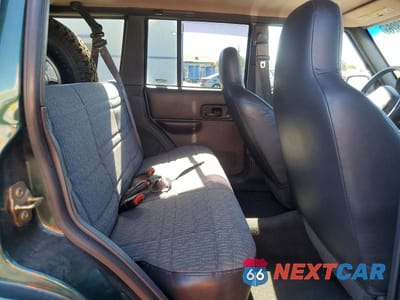 Zdjęcie 11 z 13 samochodu: 2000 JEEP CHEROKEE SPORT VIN:1J4FF48S9YL268300 - miniatura