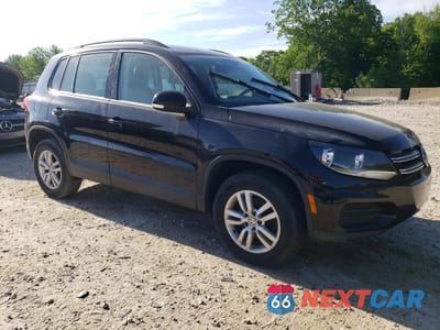 Czwarte zdjęcie samochodu z boku: 2016 VOLKSWAGEN TIGUAN S VIN:WVGBV7AX1GW594647 - miniatura