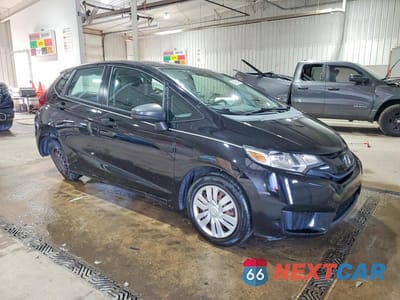 Czwarte zdjęcie samochodu z boku: 2015 HONDA FIT LX VIN:3HGGK5G50FM766941 - miniatura