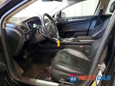 Zdjęcie 7 z 12 samochodu: 2019 FORD FUSION TITANIUM VIN:3FA6P0D94KR118849 - miniatura