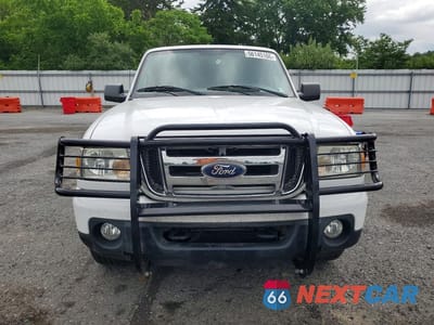 Piąte zdjęcie samochodu w środku: 2011 FORD RANGER SUPER CAB VIN:1FTLR4FEXBPA83704 - miniatura