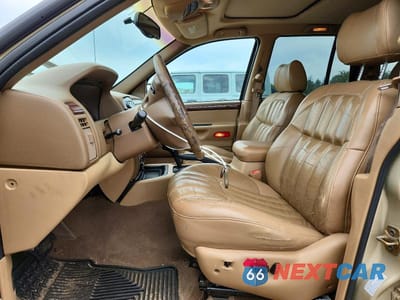 Zdjęcie 7 z 13 samochodu: 2000 JEEP GRAND CHEROKEE LIMITED VIN:1J4G258S4YC367600 - miniatura