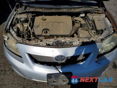 Zdjęcie 11 z 12 samochodu: 2009 TOYOTA COROLLA LE VIN:1NXBU40EX9Z069781 - miniatura