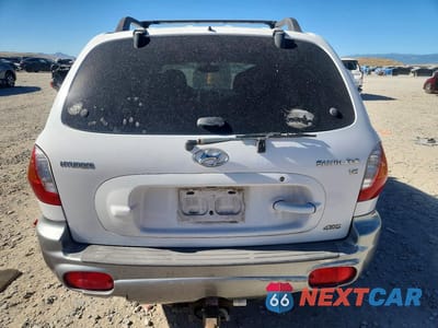Zdjęcie 6 z 12 samochodu: 2003 HYUNDAI SANTA FE GLS VIN:KM8SC73D03U416078 - miniatura