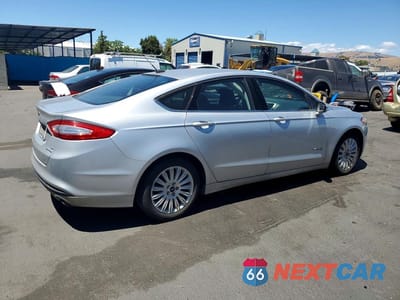 Trzecie zdjęcie samochodu z tyłu: 2016 FORD FUSION SE HYBRID VIN:3FA6P0LU0GR397245 - miniatura
