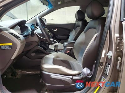 Zdjęcie 7 z 14 samochodu: 2011 HYUNDAI TUCSON GLS VIN:KM8JUCAC8BU136449 - miniatura