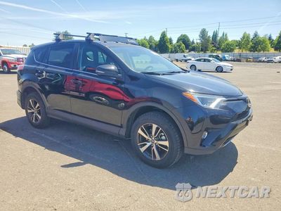 Czwarte zdjęcie samochodu z boku: 2018 TOYOTA RAV4 XLE VIN:2T3RFREV2JW792387 - miniatura