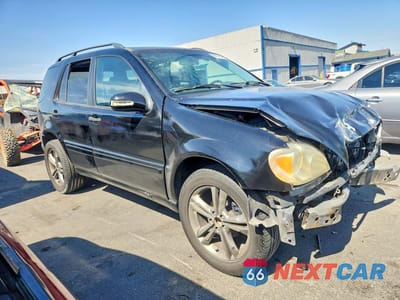 Czwarte zdjęcie samochodu z boku: 2003 MERCEDES-BENZ ML 350 VIN:4JGAB57EX3A423983 - miniatura