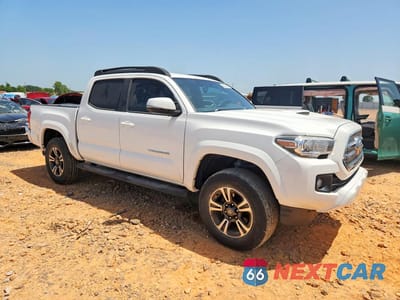 Czwarte zdjęcie samochodu z boku: 2016 TOYOTA TACOMA TRD SPORT VIN:3TMCZ5AN8GM022989 - miniatura