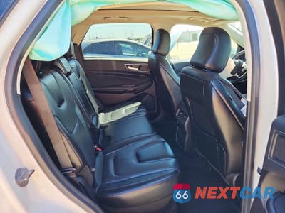 Zdjęcie 10 z 12 samochodu: 2022 FORD EDGE TITANIUM VIN:2FMPK4K92NBA57183 - miniatura