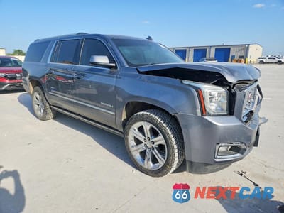 Czwarte zdjęcie samochodu z boku: 2019 GMC YUKON XL DENALI VIN:1GKS2HKJXKR263882 - miniatura