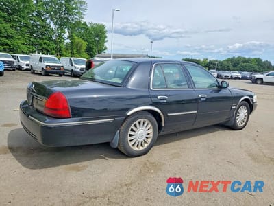 Trzecie zdjęcie samochodu z tyłu: 2010 MERCURY GRAND MARQUIS LS VIN:2MEBM7FV3AX600196 - miniatura