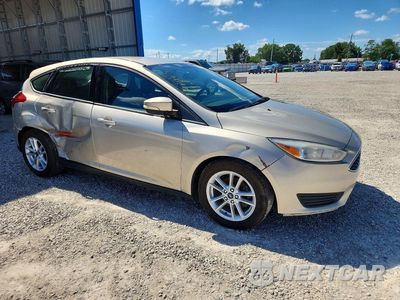 Czwarte zdjęcie samochodu z boku: 2017 FORD FOCUS SE VIN:1FADP3K21HL318335 - miniatura