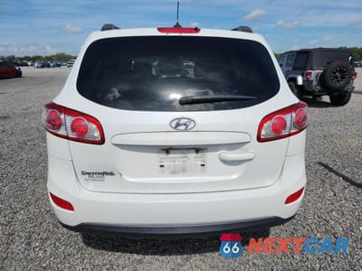 Zdjęcie 6 z 13 samochodu: 2012 HYUNDAI SANTA FE GLS VIN:5XYZG3AB2CG114567 - miniatura