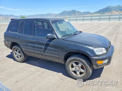 Czwarte zdjęcie samochodu z boku: 1998 TOYOTA RAV4 BASE VIN:JT3HP10V0W0177600 - miniatura