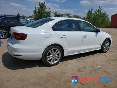 Trzecie zdjęcie samochodu z tyłu: 2017 VOLKSWAGEN JETTA SEL VIN:3VWL17AJ5HM312265 - miniatura