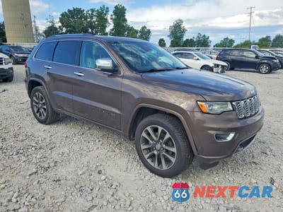 Czwarte zdjęcie samochodu z boku: 2017 JEEP GRAND CHEROKEE OVERLAND VIN:1C4RJFCG4HC842771 - miniatura