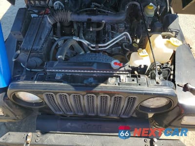Zdjęcie 12 z 13 samochodu: 2000 JEEP WRANGLER / TJ SPORT VIN:1J4FA49S0YP707891 - miniatura