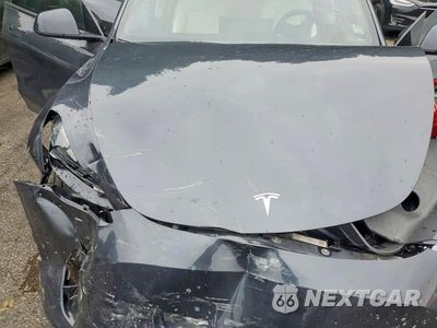 Zdjęcie 21 z 24 samochodu: 2024 TESLA MODEL Y VIN:7SAYGDEF1RF027552 - miniatura