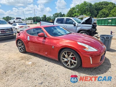 Czwarte zdjęcie samochodu z boku: 2014 NISSAN 370Z TOURING VIN:JN1AZ4EH9EM631350 - miniatura