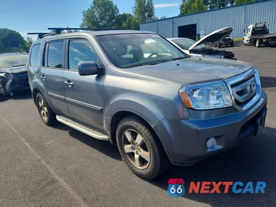 Czwarte zdjęcie samochodu z boku: 2009 HONDA PILOT EXL VIN:5FNYF48539B025983 - miniatura