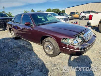 Czwarte zdjęcie samochodu z boku: 2001 FORD CROWN VICTORIA POLICE INTERCEPTOR VIN:2FAFP71W81X128819 - miniatura