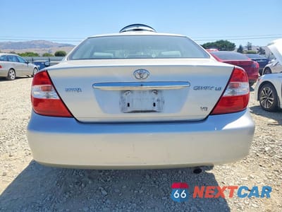 Zdjęcie 6 z 12 samochodu: 2004 TOYOTA CAMRY LE V6 VIN:4T1BF30K74U586894 - miniatura