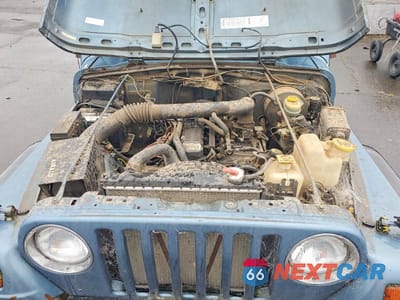 Zdjęcie 11 z 12 samochodu: 1998 JEEP WRANGLER / TJ SPORT VIN:1J4FY19S2WP739281 - miniatura