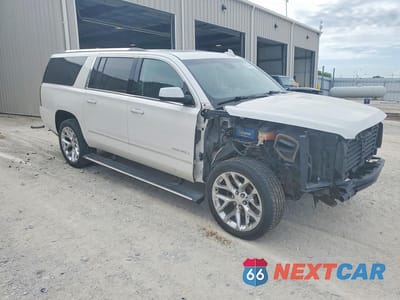 Czwarte zdjęcie samochodu z boku: 2018 GMC YUKON XL DENALI VIN:1GKS2HKJXJR124009 - miniatura