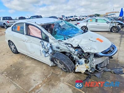 Czwarte zdjęcie samochodu z boku: 2013 HONDA CIVIC HYBRID L VIN:19XFB4F32DE002861 - miniatura