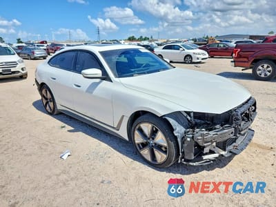 Czwarte zdjęcie samochodu z boku: 2023 BMW I4 EDRIVE 35 VIN:WBY43AW05PFP98796 - miniatura