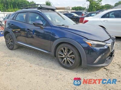 Czwarte zdjęcie samochodu z boku: 2016 MAZDA CX-3 GRAND TOURING VIN:JM1DKBD78G0113011 - miniatura