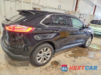 Trzecie zdjęcie samochodu z tyłu: 2019 FORD EDGE TITANIUM VIN:2FMPK4K95KBB57354 - miniatura