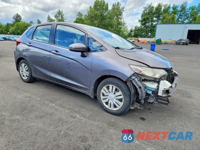 Czwarte zdjęcie samochodu z boku: 2016 HONDA FIT LX VIN:JHMGK5H53GS003283 - miniatura