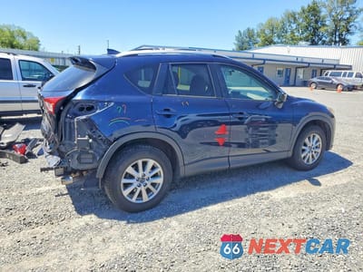 Trzecie zdjęcie samochodu z tyłu: 2016 MAZDA CX-5 TOURING VIN:JM3KE4CY7G0921006 - miniatura