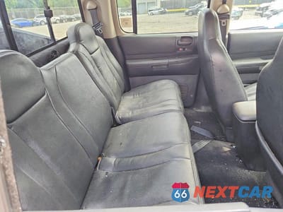 Zdjęcie 10 z 12 samochodu: 2003 DODGE DAKOTA QUAD SLT VIN:1D7HG48N03S308614 - miniatura