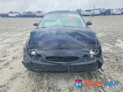 Piąte zdjęcie samochodu w środku: 1999 FORD TAURUS SE VIN:1FAFP53S2XA169429 - miniatura