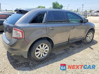 Trzecie zdjęcie samochodu z tyłu: 2010 FORD EDGE SEL VIN:2FMDK3JC3ABA61019 - miniatura