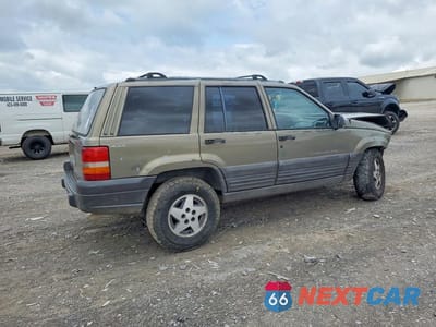 Trzecie zdjęcie samochodu z tyłu: 1997 JEEP GRAND CHEROKEE VIN:1J4GZ58Y1VC709046 - miniatura