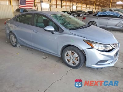 Czwarte zdjęcie samochodu z boku: 2017 CHEVROLET CRUZE LS VIN:1G1BC5SM3H7140763 - miniatura