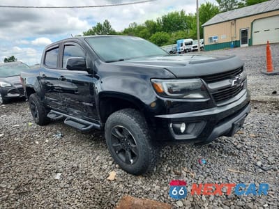 Czwarte zdjęcie samochodu z boku: 2018 CHEVROLET COLORADO Z71 VIN:1GCGTDEN1J1299138 - miniatura