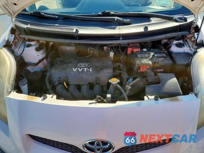 Zdjęcie 11 z 12 samochodu: 2009 TOYOTA YARIS BASE VIN:JTDJT903295263407 - miniatura