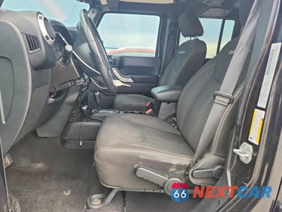 Zdjęcie 7 z 13 samochodu: 2016 JEEP WRANGLER UNLIMITED SAHARA VIN:1C4BJWEG7GL162814 - miniatura