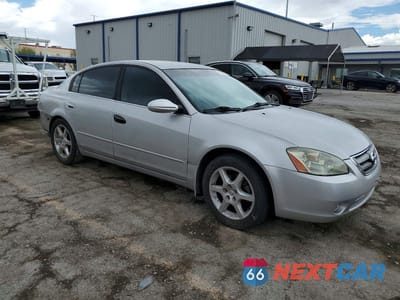 Czwarte zdjęcie samochodu z boku: 2004 NISSAN ALTIMA SE VIN:1N4BL11D14C143461 - miniatura