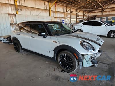 Czwarte zdjęcie samochodu z boku: 2021 MINI COOPER S CLUBMAN ALL4 VIN:WMWXJ1C06M2P38700 - miniatura