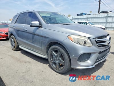 Czwarte zdjęcie samochodu z boku: 2016 MERCEDES-BENZ GLE 400 4MATIC VIN:4JGDA5GB6GA624209 - miniatura
