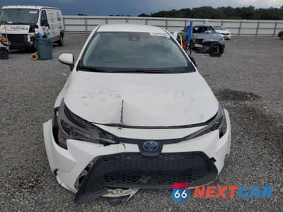 Piąte zdjęcie samochodu w środku: 2021 TOYOTA COROLLA LE VIN:JTDEAMDE2MJ004809 - miniatura