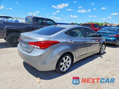 Trzecie zdjęcie samochodu z tyłu: 2012 HYUNDAI ELANTRA LIMITED VIN:KMHDH4AE6CU266269 - miniatura