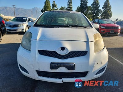 Piąte zdjęcie samochodu w środku: 2011 TOYOTA YARIS BASE VIN:JTDKT4K36B5331721 - miniatura